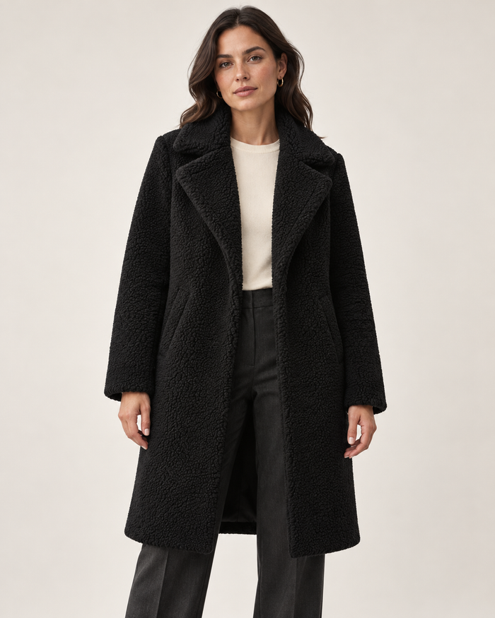 Women's black long textured jacket, front view