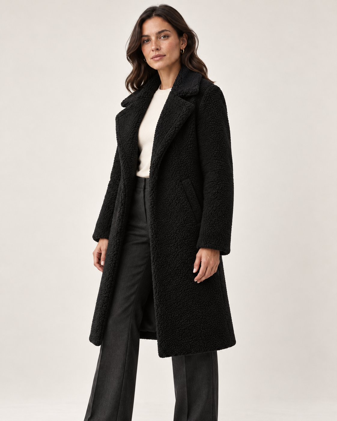 Women's black long textured jacket, three-quarter view