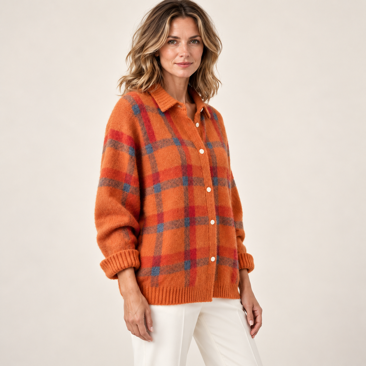 Orange check cardigan — three-quarter on model