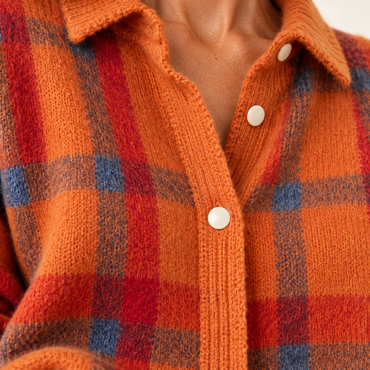 Orange check cardigan — knit/button detail