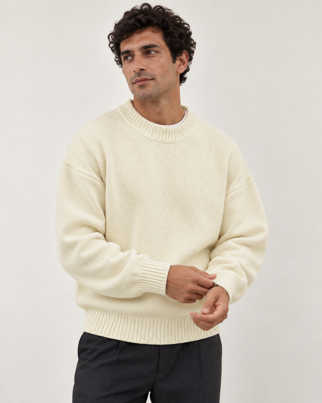 Men's crew neck jumper in cream, styling view