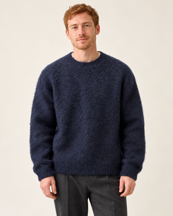Men's knitted jumper in navy blue, front view