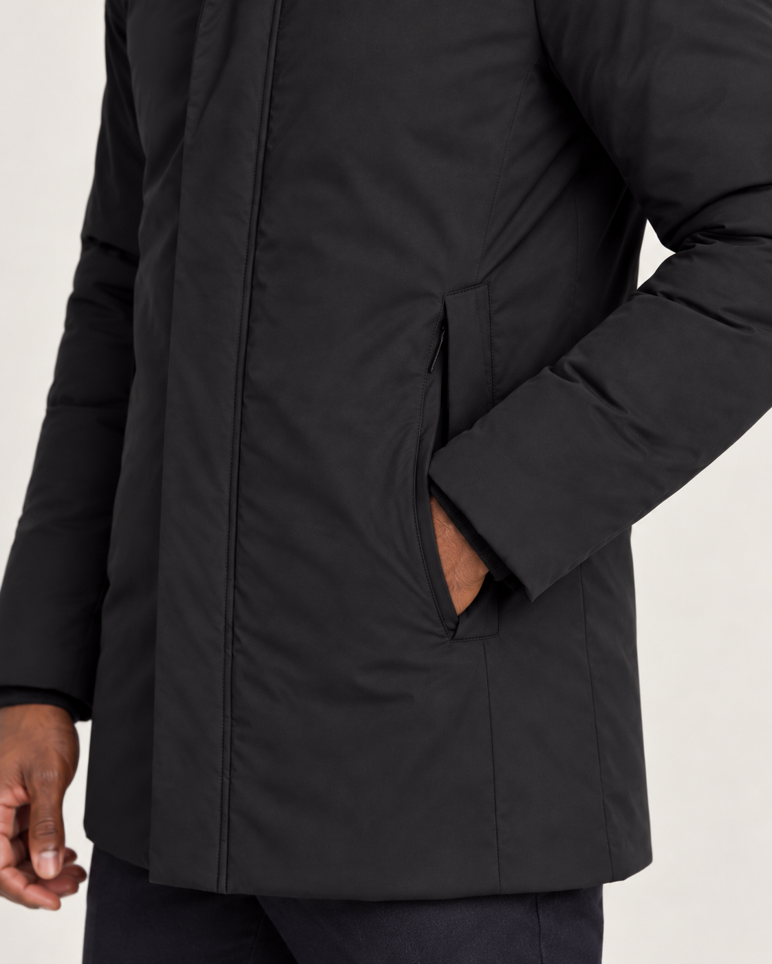 Men's hooded puffer jacket in black, detail view