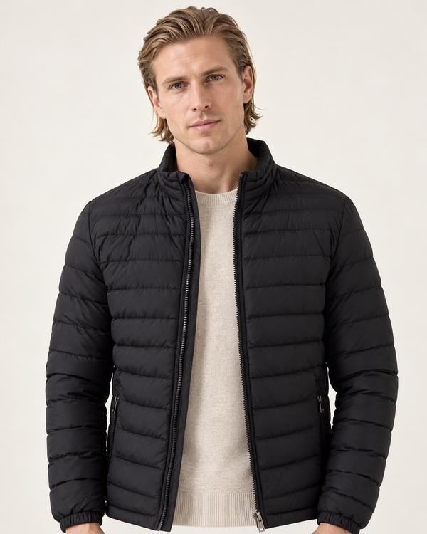 Men's lightweight puffer jacket in black, front view