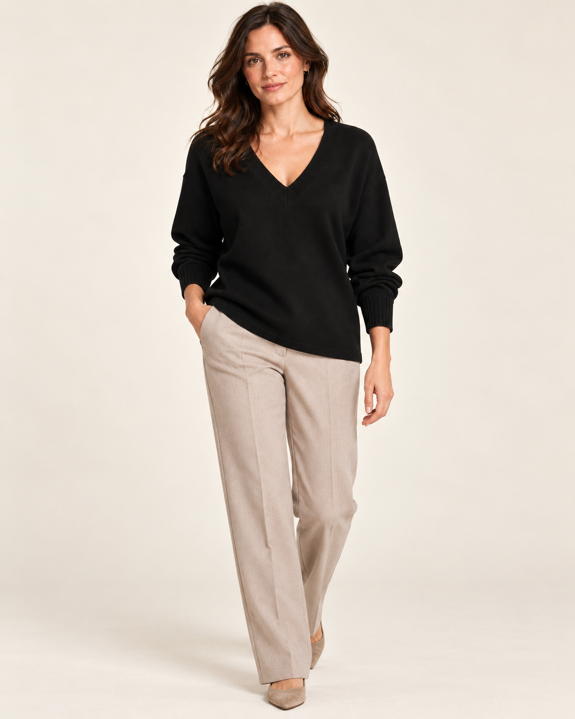 Women's black V neck fine knit jumper on model - 05-styling