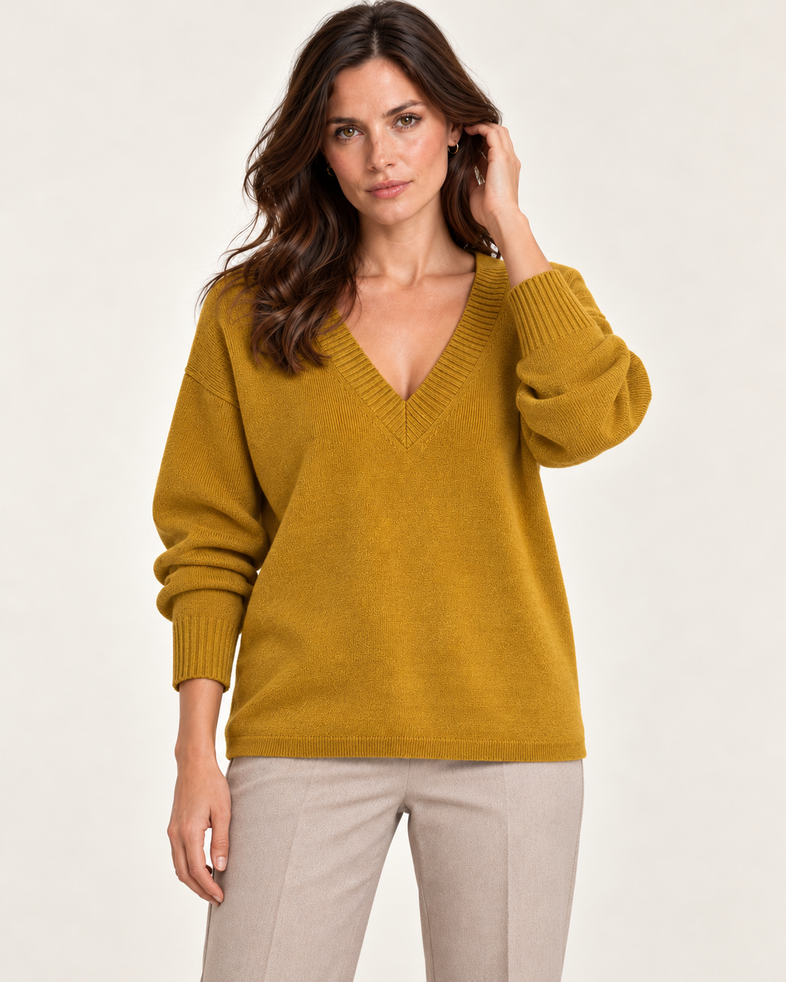 Women's Gold V neck fine knit jumper - front on model