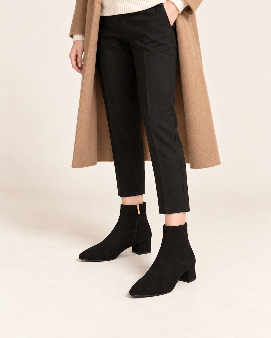 Women's black low heel ankle boots - styling on model