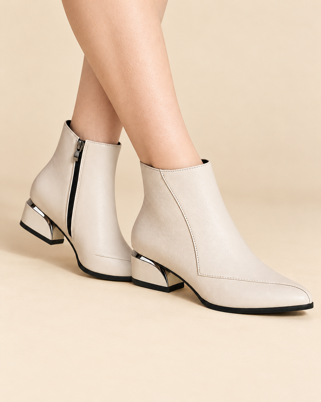 Women's ankle boots in off white, seated view