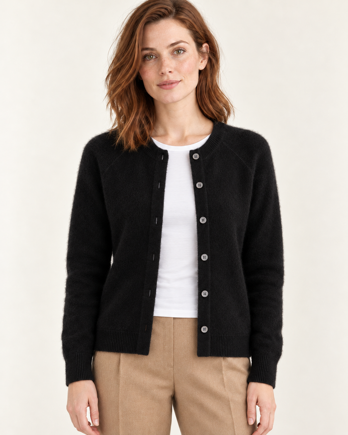 Women's cardigan in black, worn open, front view