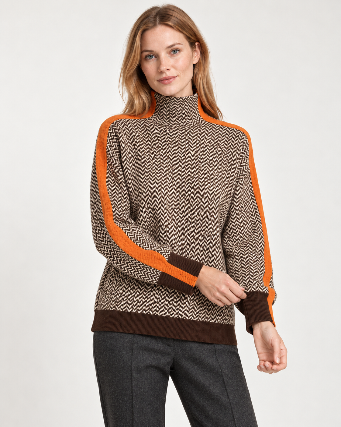 Women's high neck jumper in orange, styling view