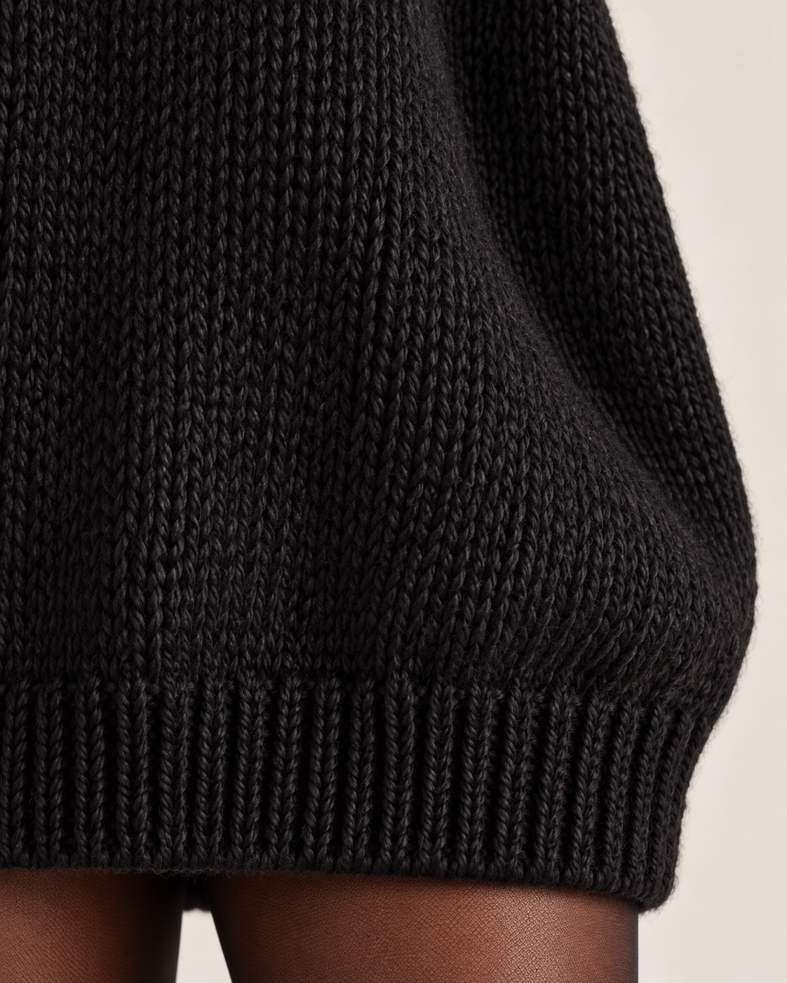 Women's jumper dress in black, knit and hem detail