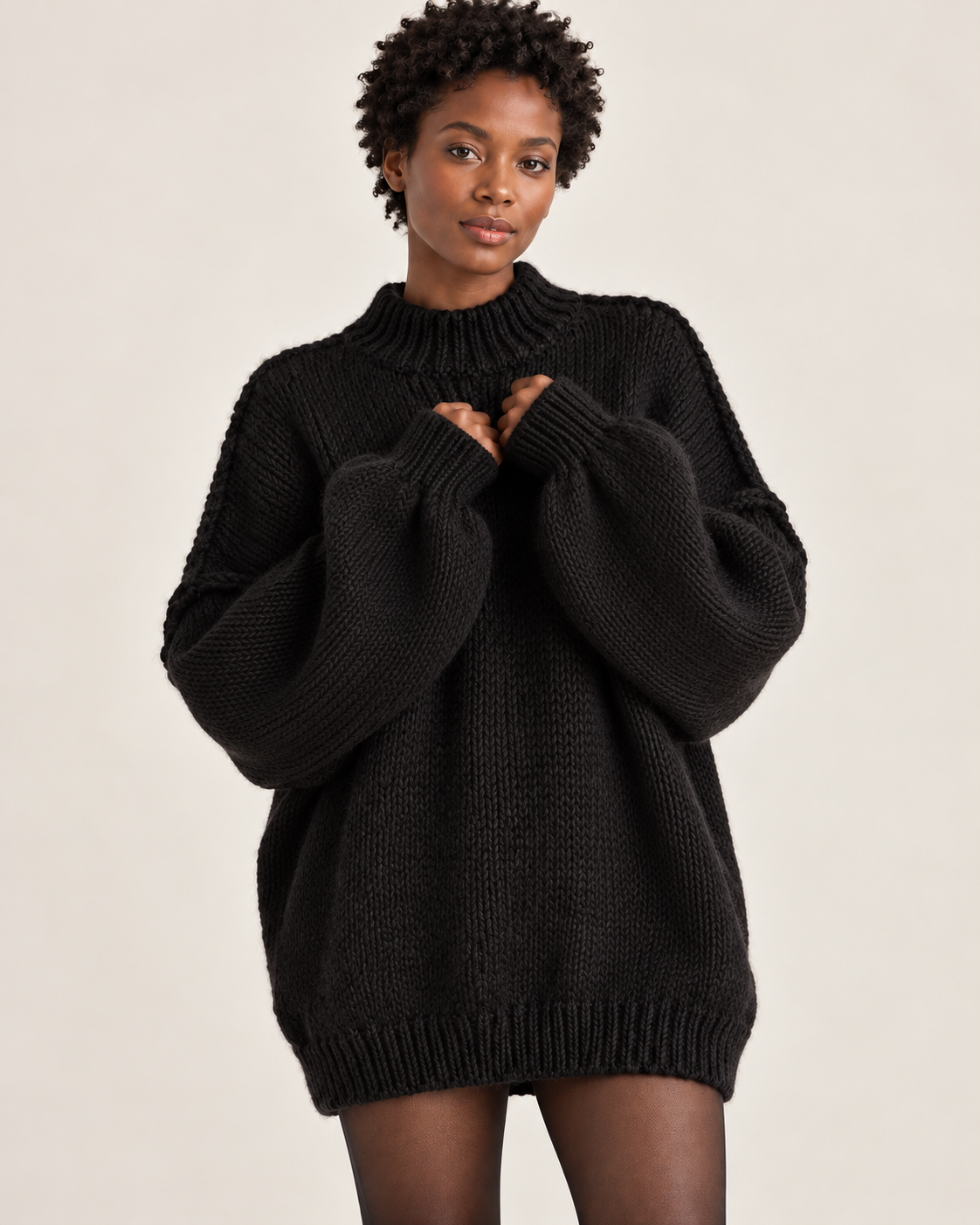 Women's jumper dress in black, relaxed front view