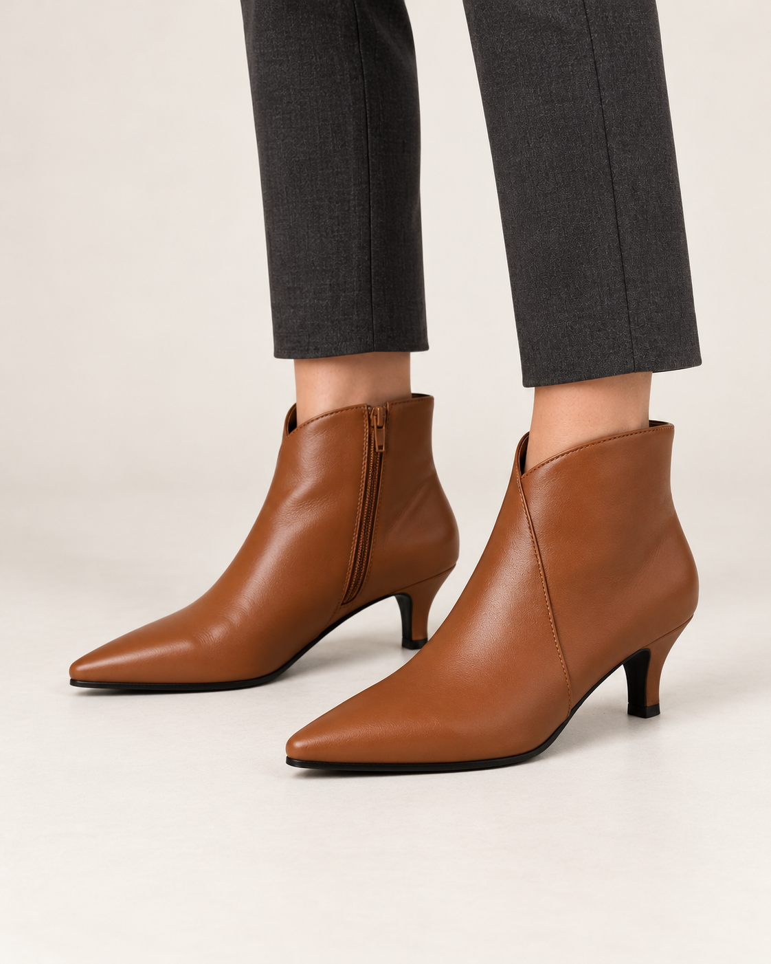 Women's kitten heel ankle boots in brown, front three-quarter view