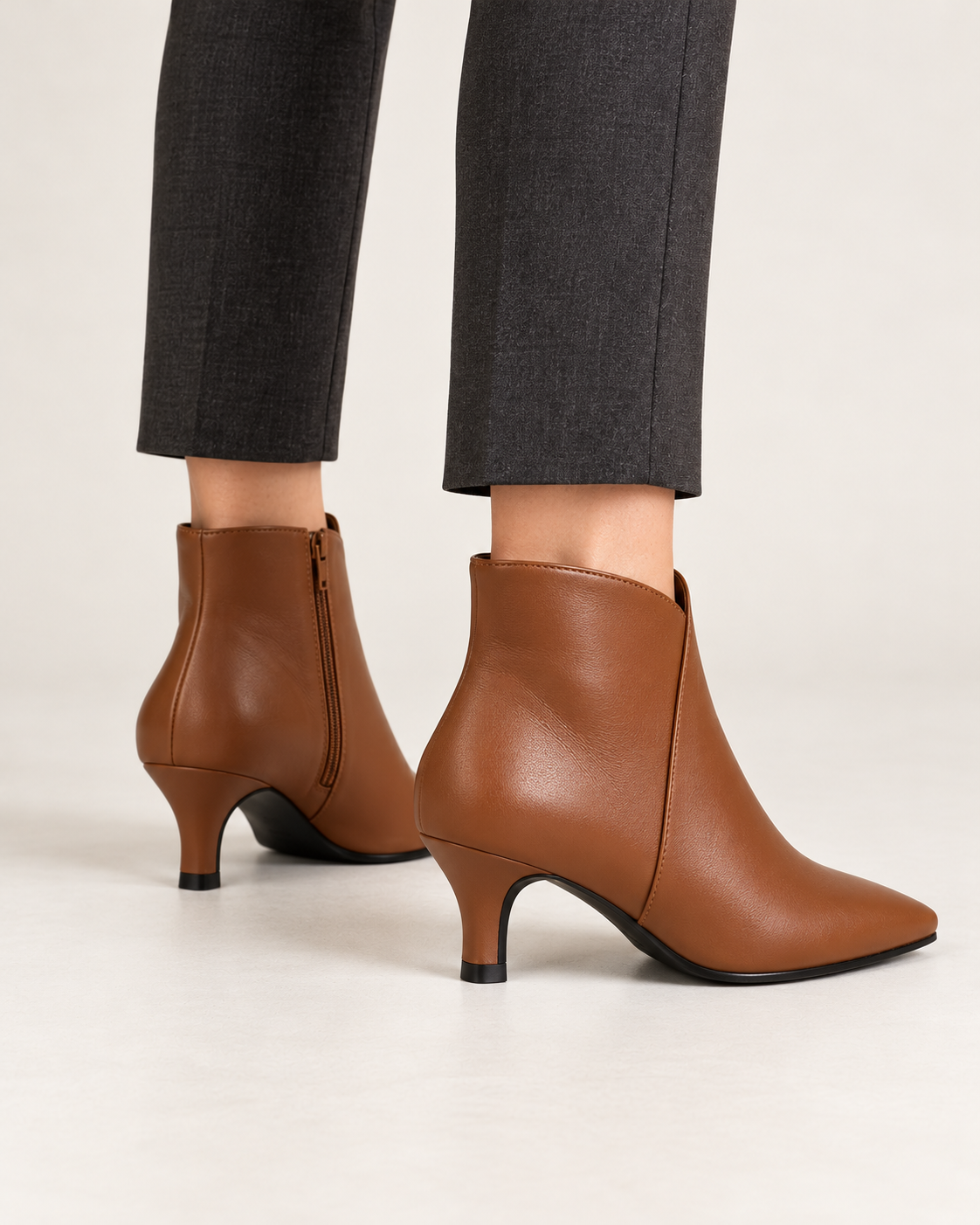 Women's kitten heel ankle boots in brown, rear heel view
