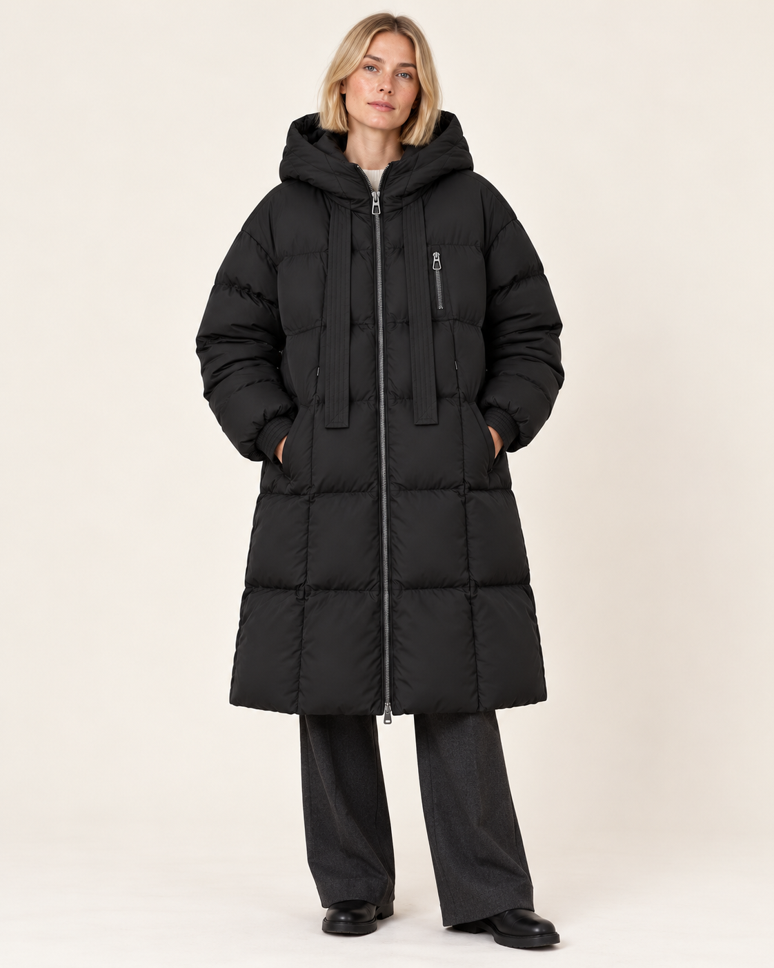 Women's long puffer coat in black, front view