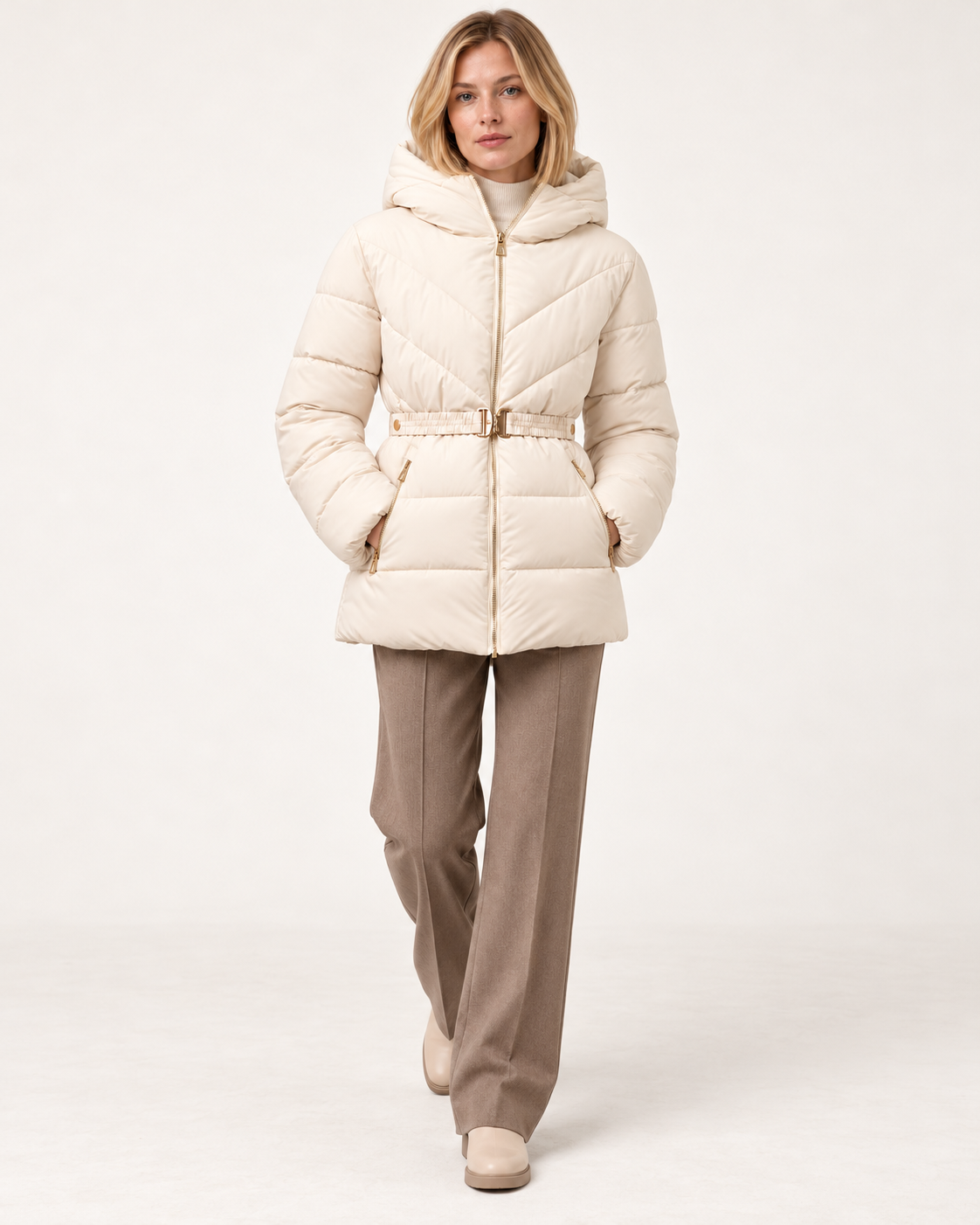 Women's belted puffer jacket in Pearl White, styling shot