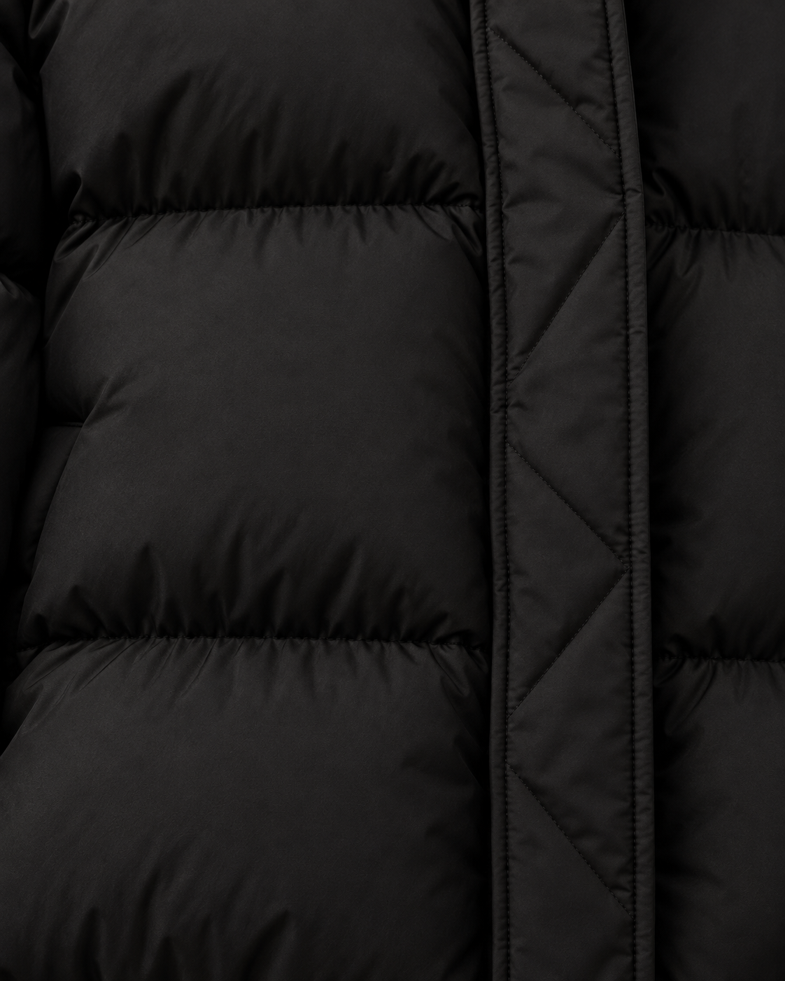 Women's puffer jacket in black, padded fabric detail
