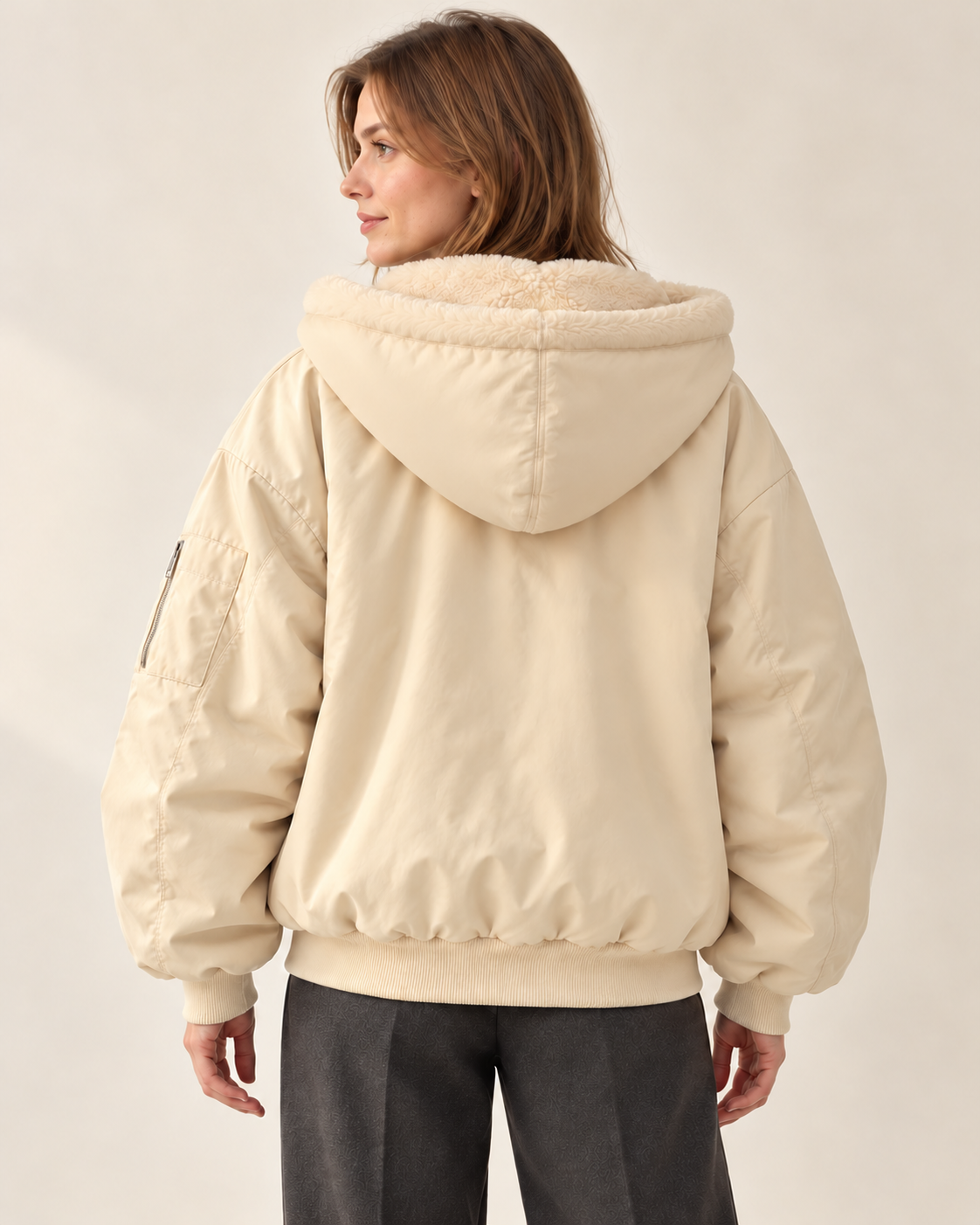 Women's winter jacket in beige, back view