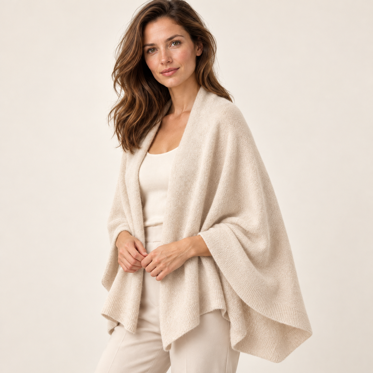 Beige scarf — Three-quarter view of the same woman wearing the same pale beige scarf draped over shoulders