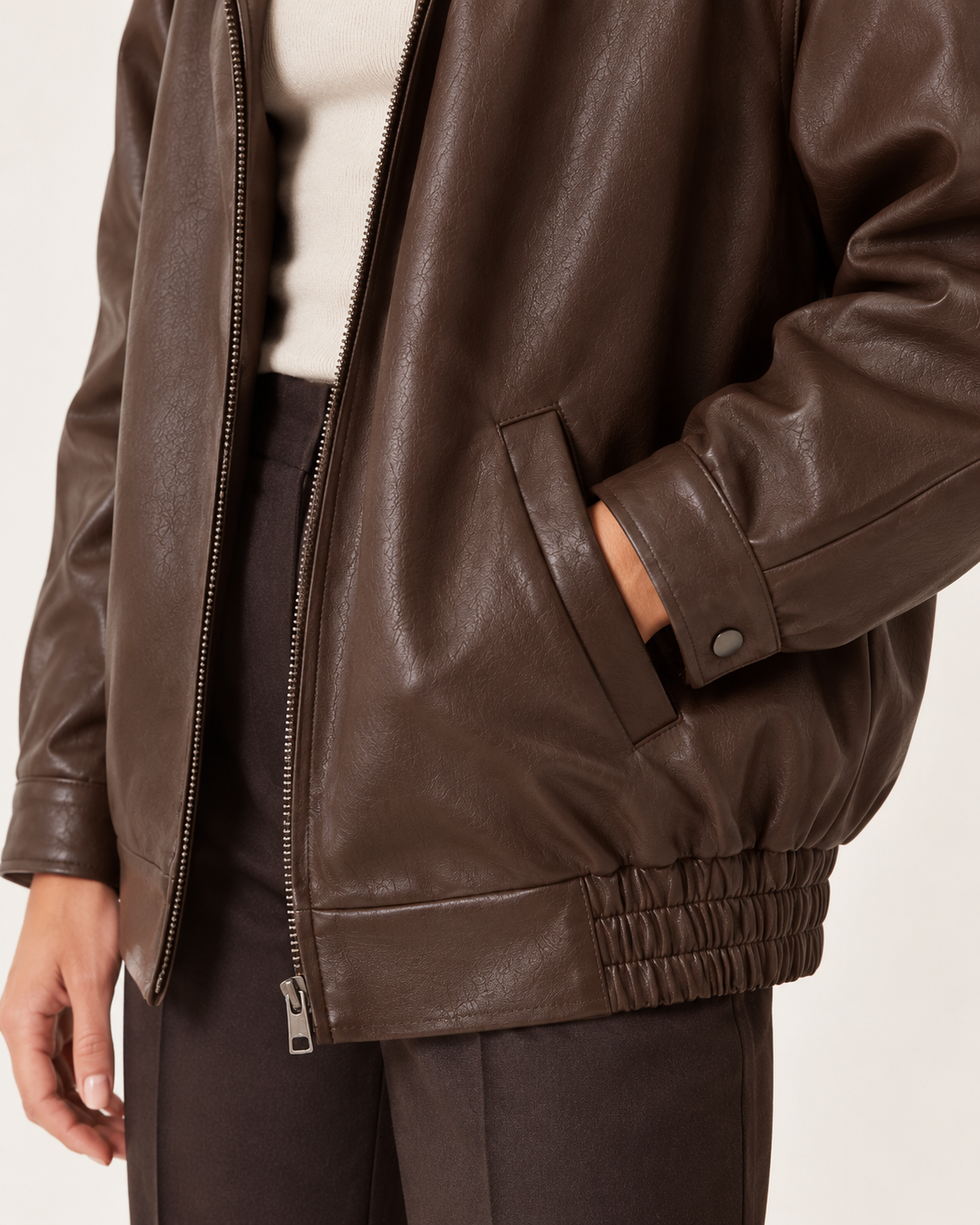 Brown pocket cuff and hem detail