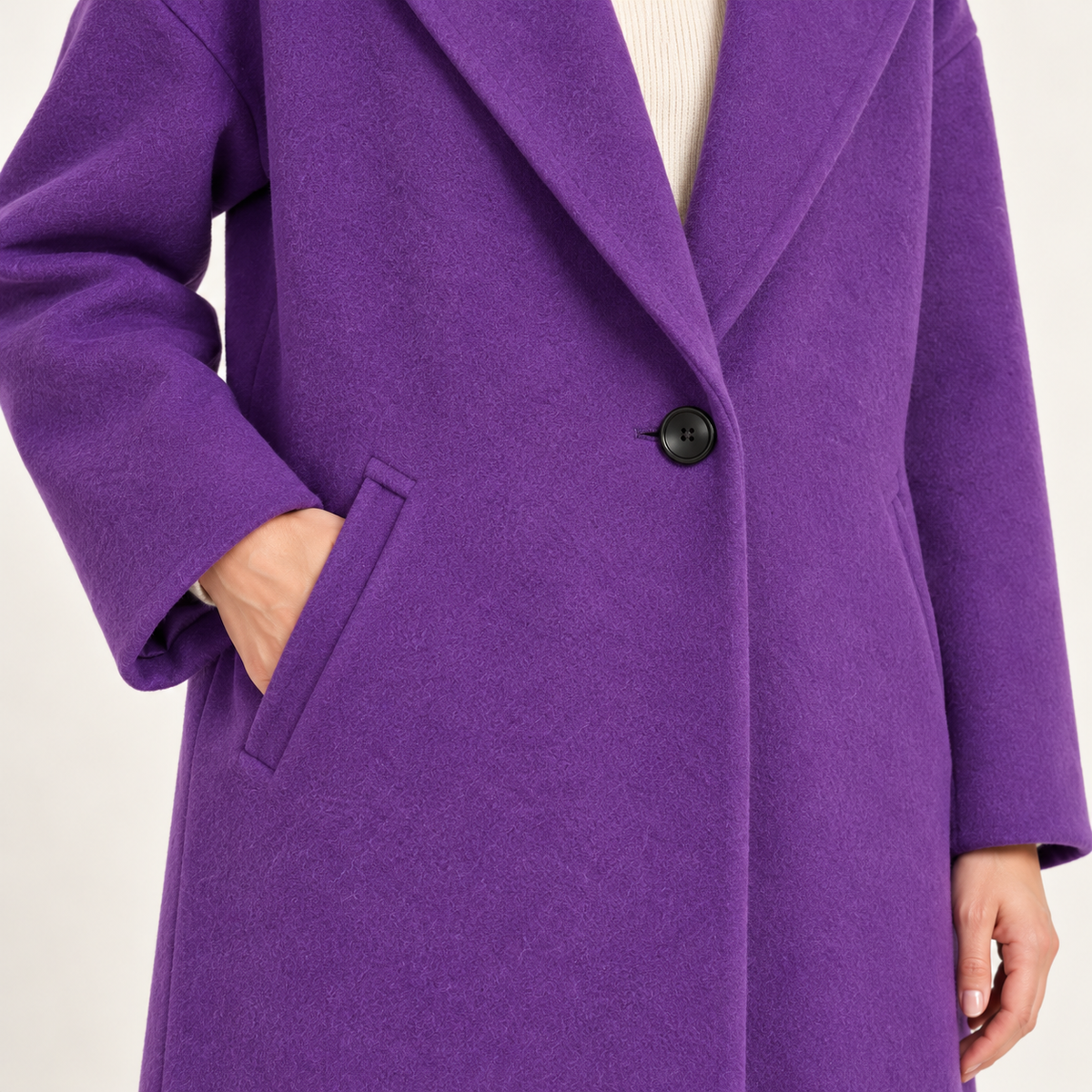 Purple coat – button and pocket detail